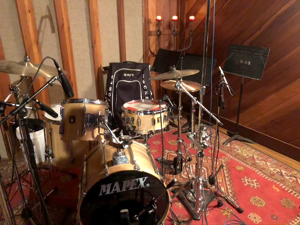 Mapex drum kit miked up in the live room